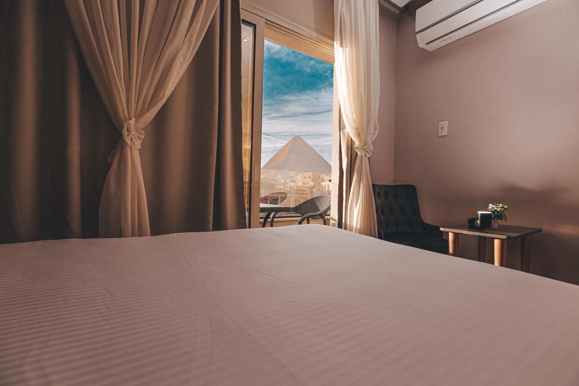 Steps In Pyramids View Hotel Kafret el-Gabal Exterior foto