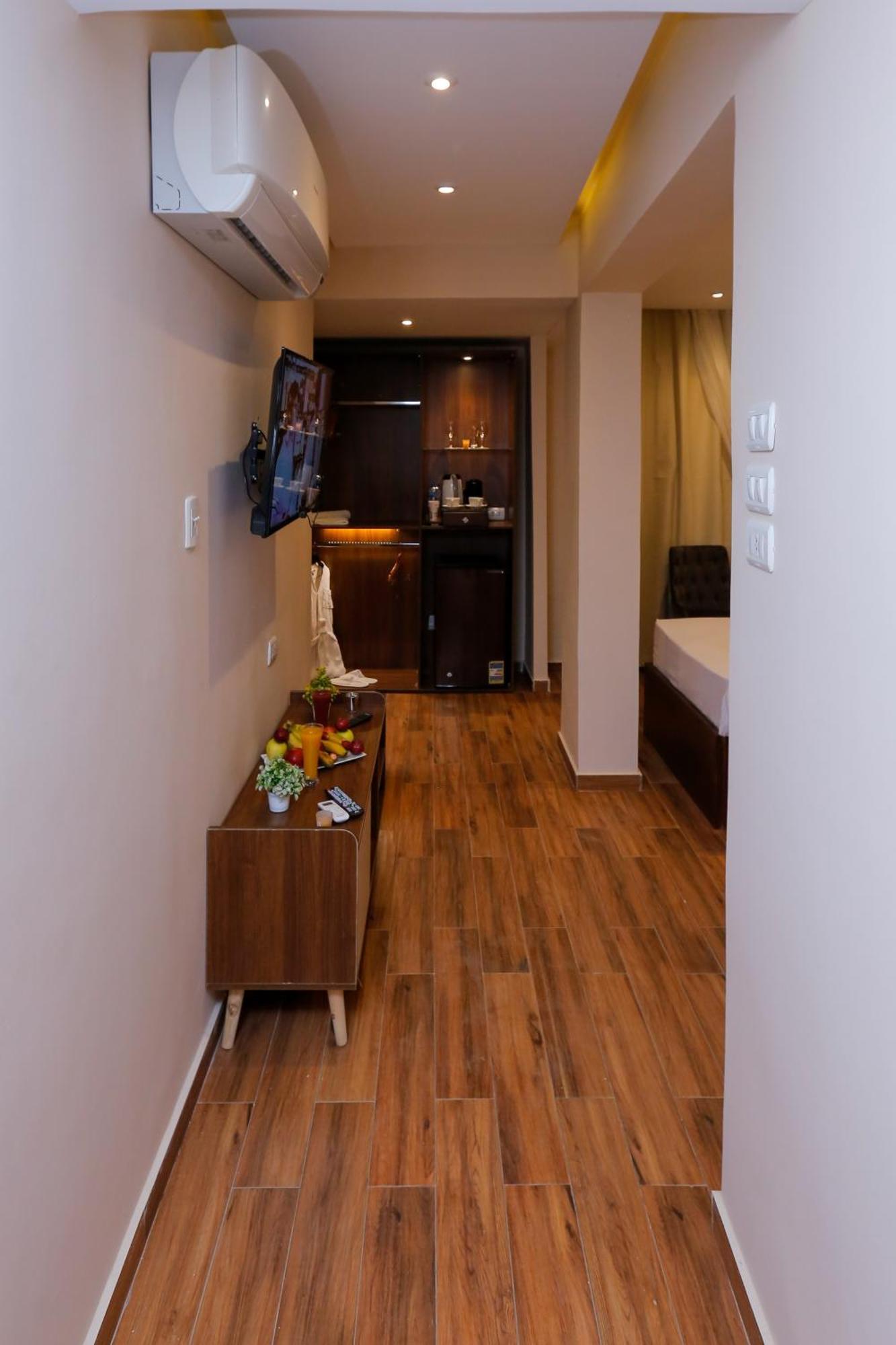 Steps In Pyramids View Hotel Kafret el-Gabal Exterior foto