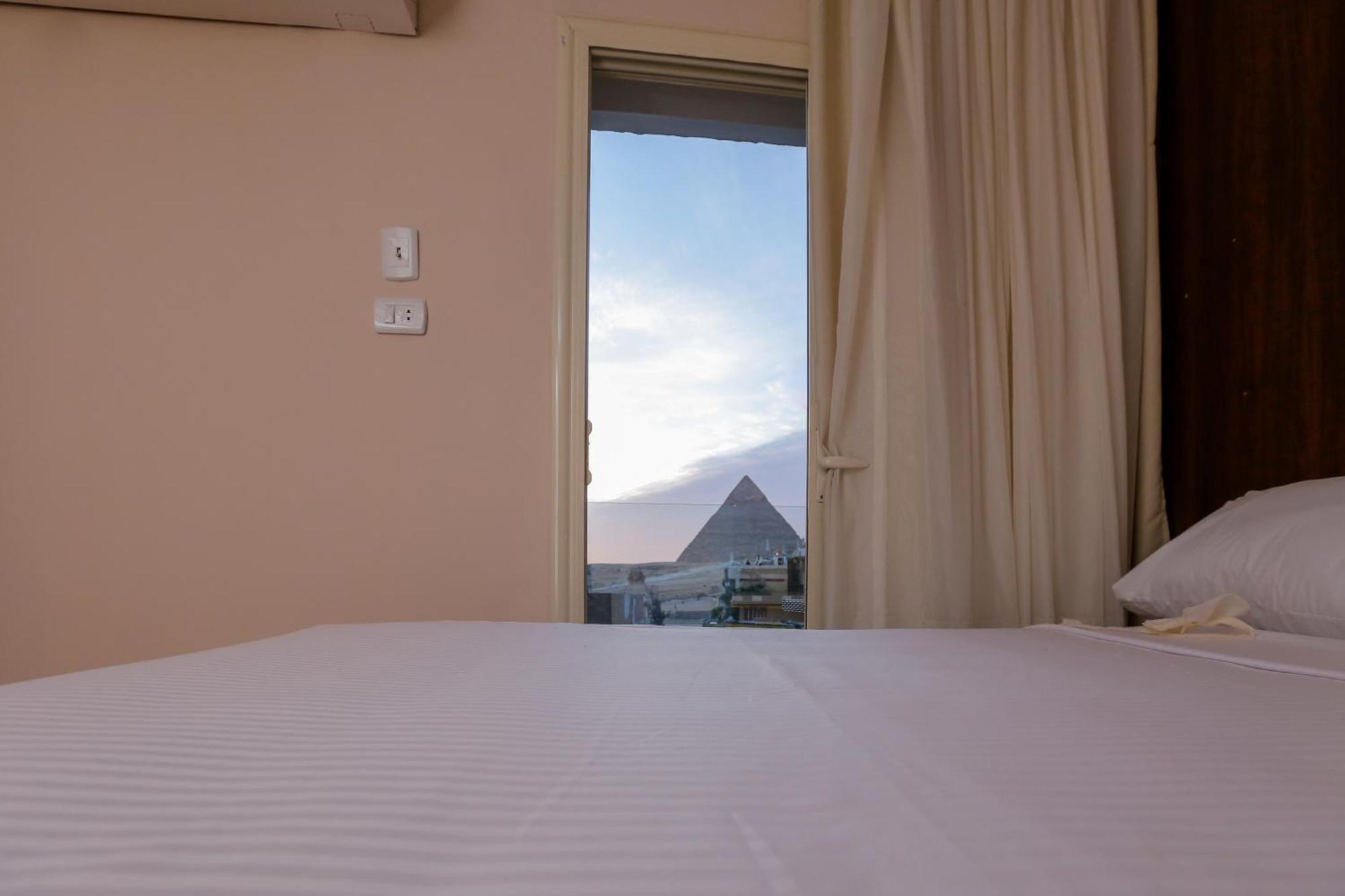 Steps In Pyramids View Hotel Kafret el-Gabal Exterior foto