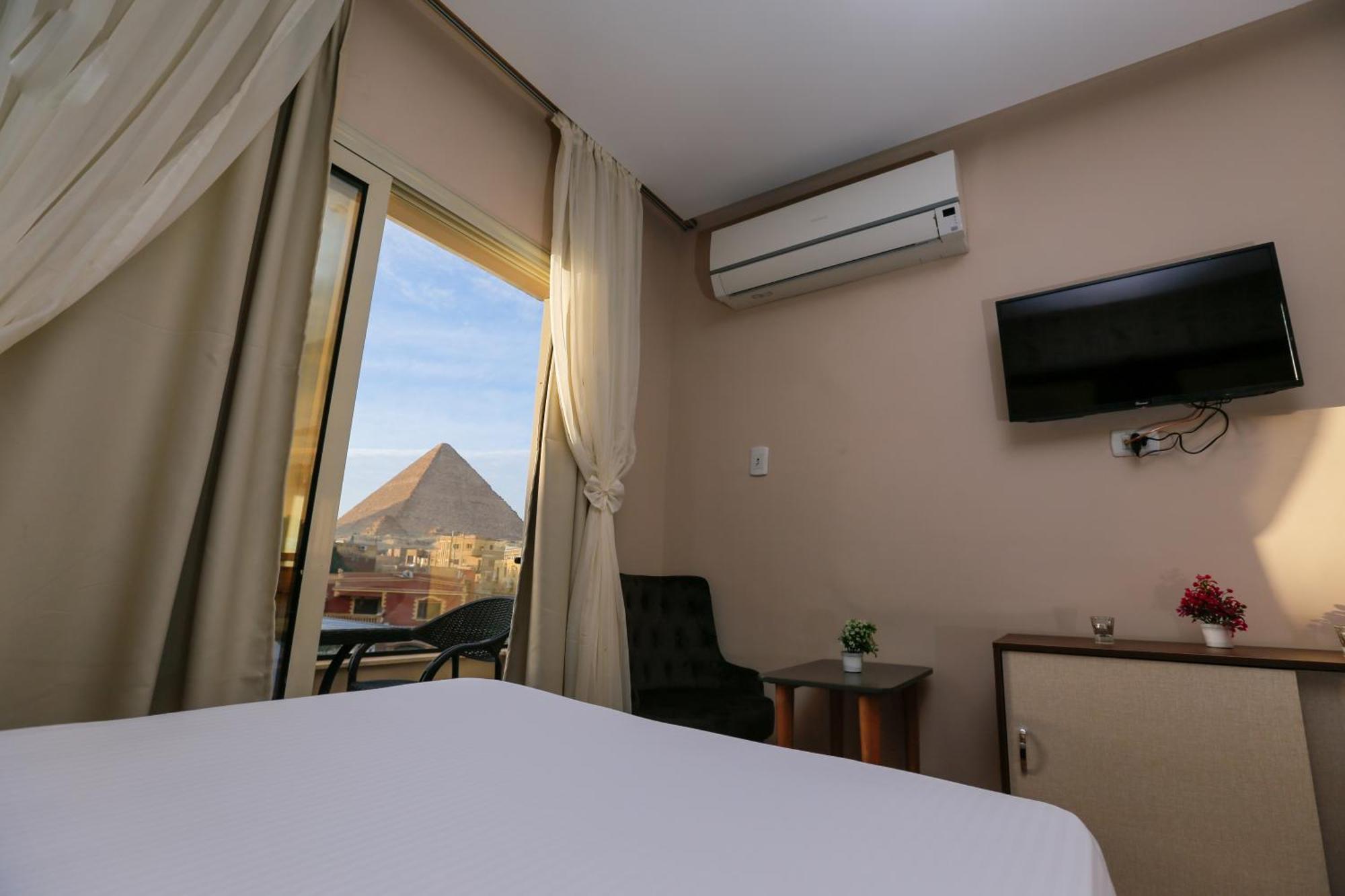 Steps In Pyramids View Hotel Kafret el-Gabal Exterior foto